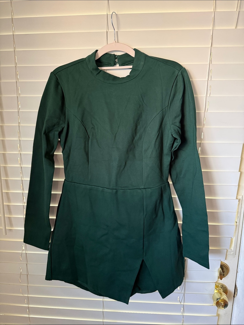 Forest Green Long-Sleeve Romper with open back.